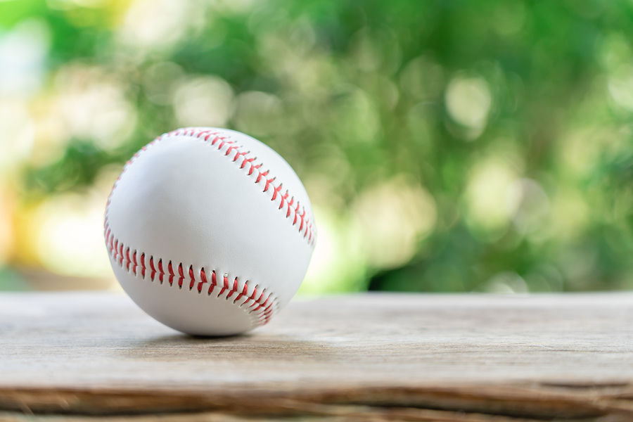 Baseball On Abstract Background And Red Stitching Baseball. White Baseball With Red Thread.baseball